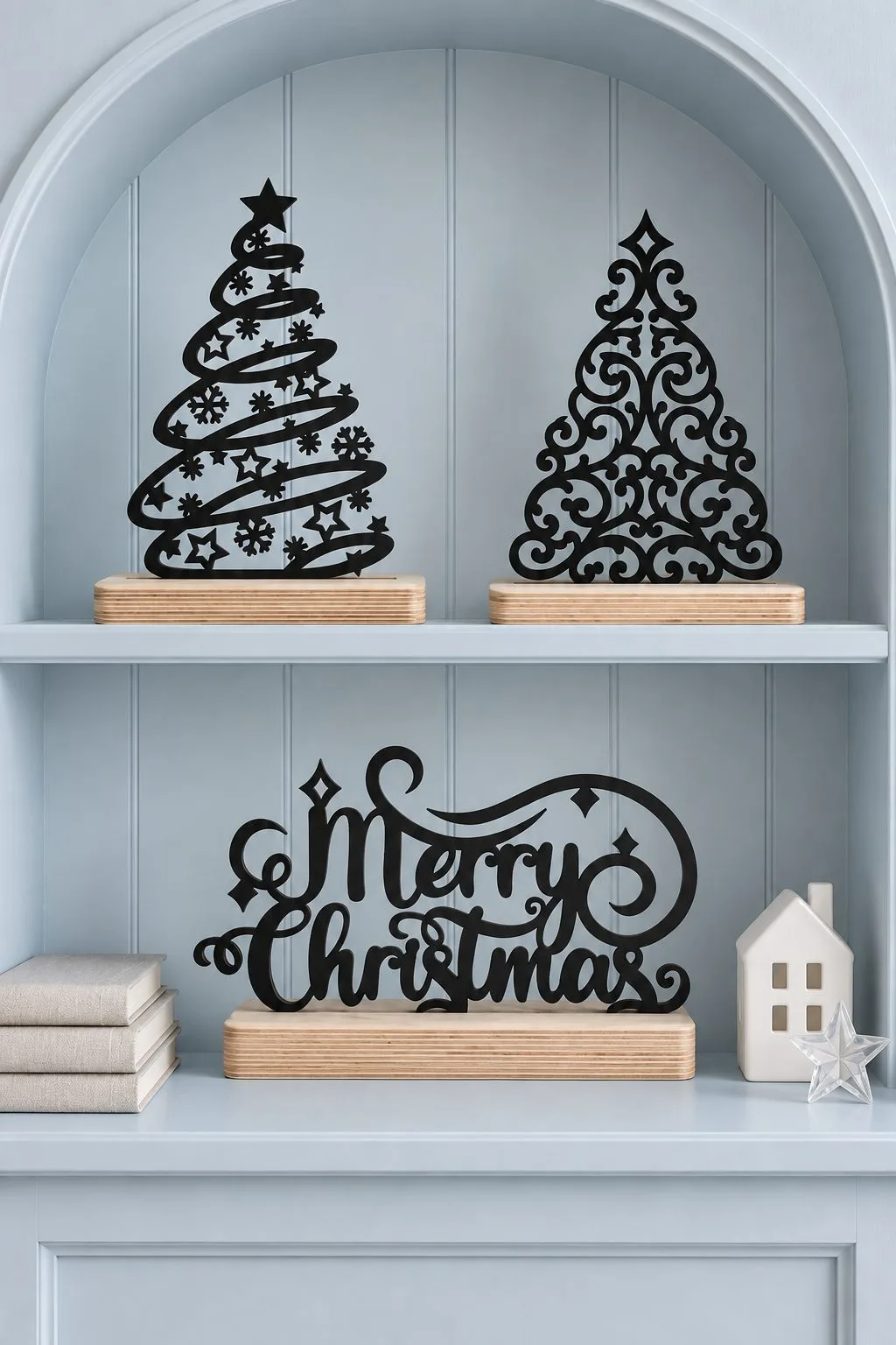 Laser cut ribbon and filigree Christmas trees with Merry Christmas lettering on a shelf, free laser cut SVG from svgdiy.com
