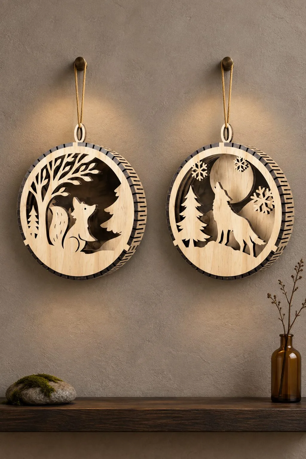 Two round layered ornaments with a fox and a wolf in a winter forest, free laser cut SVG from svgdiy.com